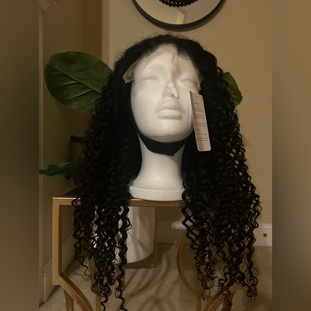 20’ deep curl lace wig.